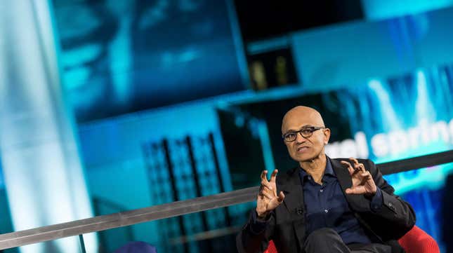 Satya Nadella gestures with his hands in a claw-like gesture at the Axel Springer award at Axel Springer Neubau on October 17, 2023 in Berlin, Germany.